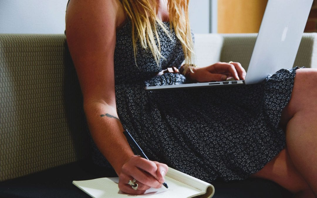 Woman writing her events checklist